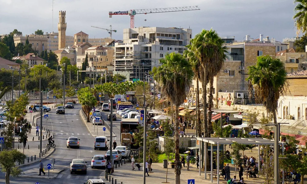 The Aliyah Ledger, a Jerusalem street photographed on a weekday afternoon